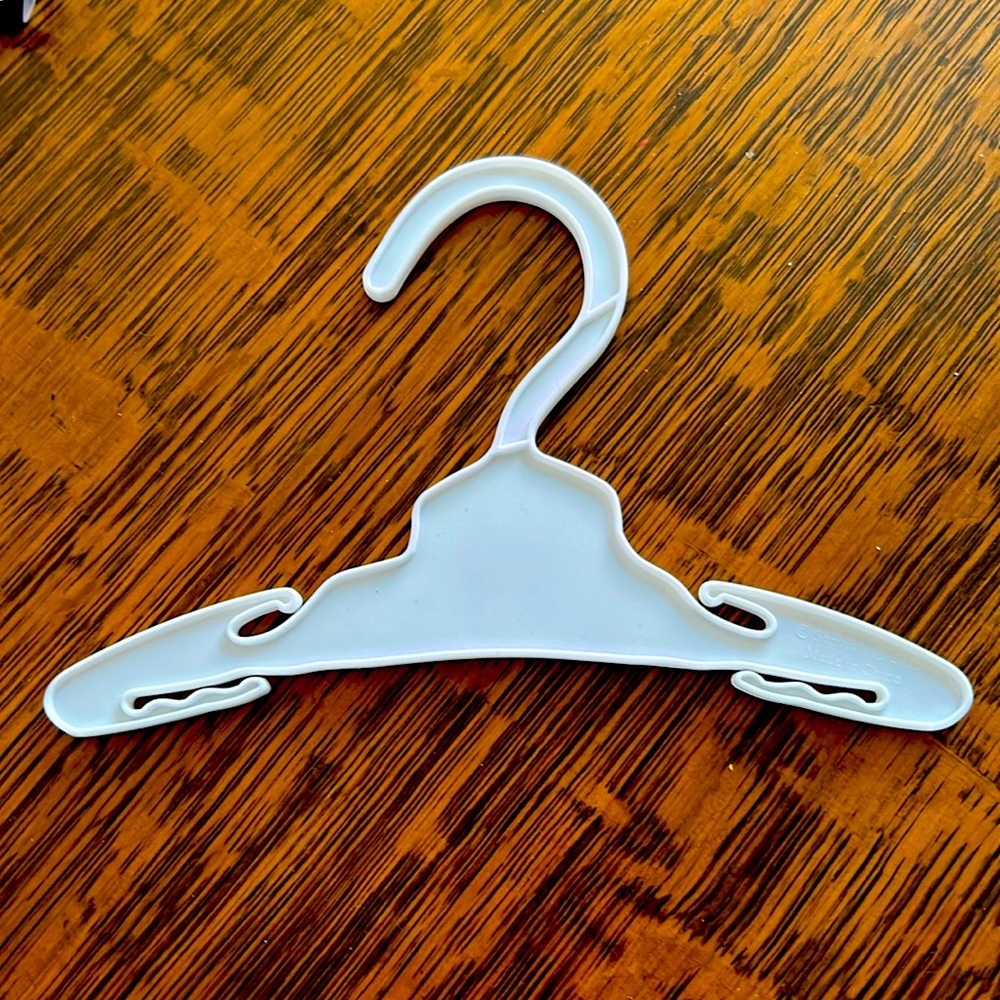 Doll hangers for 18” doll,larger or smaller plastic have notches to hold clothes